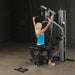 Body-Solid Single Stack Gym G5S - Woman preparing for workout