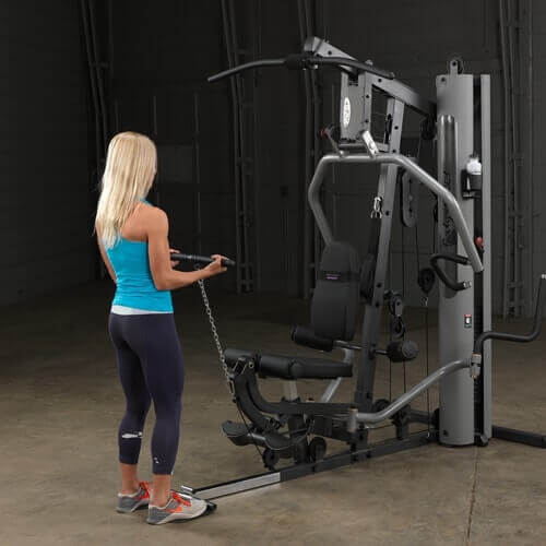 Body-Solid Single Stack Gym G5S - Woman standing up pulling weights