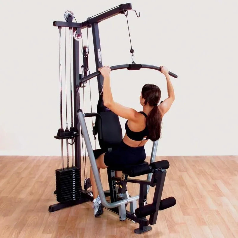 Body-Solid Single Stack Home Gym G1S - Woman sitting on bench pulling weights