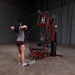 Body-Solid Single Stack Home Gym G6BR - Woman in gray shirt pulling rope while standing