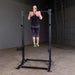 Body Solid SPR500 Pro Club Line Half Cage - woman doing pull ups