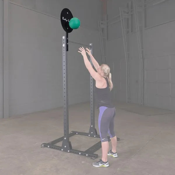 Body Solid SPR500 Pro Club Line Half Cage - woman throwing a ball