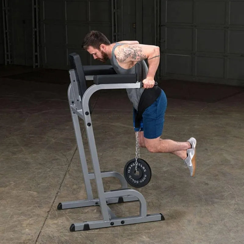 Body-Solid Vertical Knee Raise and Dip GVKR60 - Man lifting his body