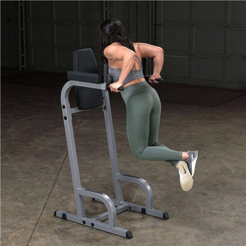 Body-Solid Vertical Knee Raise and Dip GVKR60 - Woman lifting her body weight