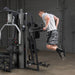 Body-Solid Vertical Knee Raise Attachment GKR9 - Man lifting his body