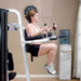 Body-Solid Vertical Knee Raise Station VKR30 - Woman doing knee raise