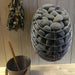 HUUM DROP Series 7.5kW Sauna Heater Package - a basket of rocks and a bucket of dried herbs