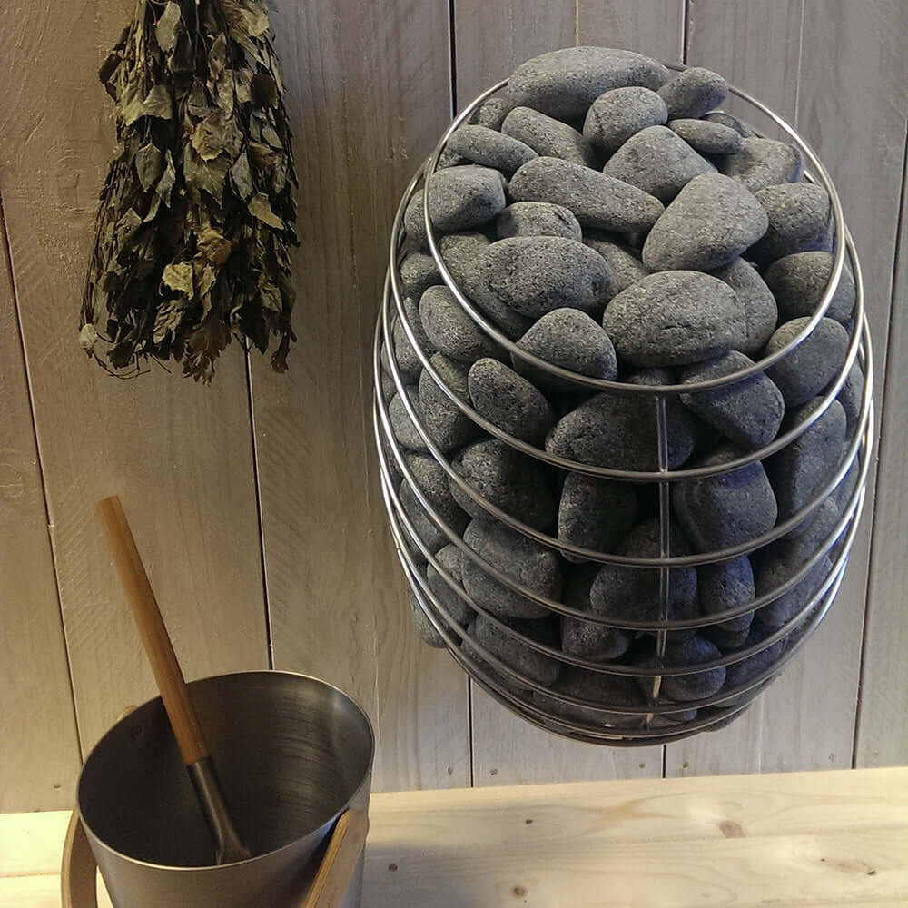 HUUM DROP Series 9.0kW Sauna Heater Package - a basket of rocks and a bucket of dried herbs