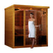 Dynamic Monaco 6-Person Ultra Low EMF FAR Infrared Sauna (Canadian Hemlock) - Woman in white towel standing outside the sauna