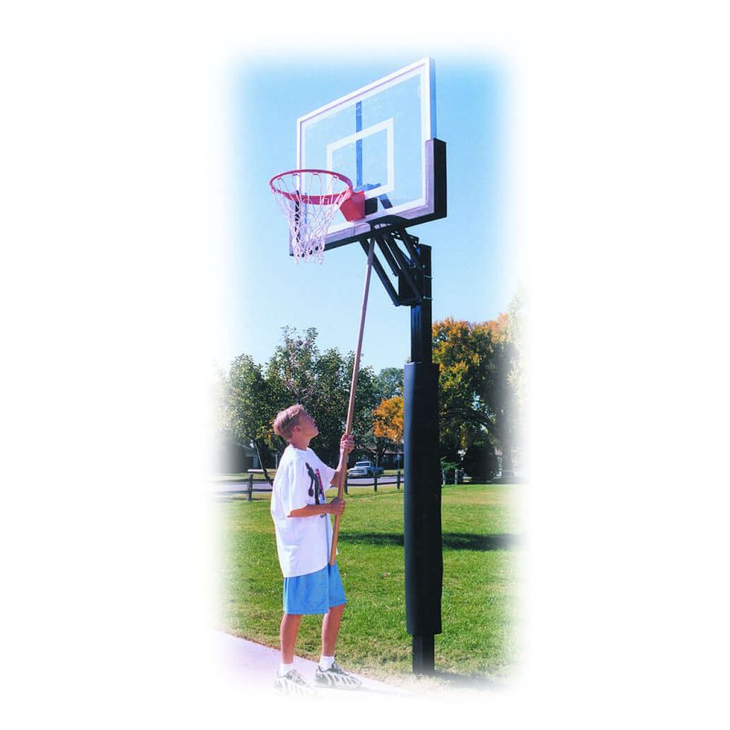 First Team Champ In-Ground Adjustable Basketball Hoop - with a person