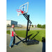 First Team OmniJam Portable Basketball Hoop - person setting up the  item