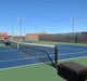 First Team PortaCourt Sentry Portable Tennis Set - setup in playing court