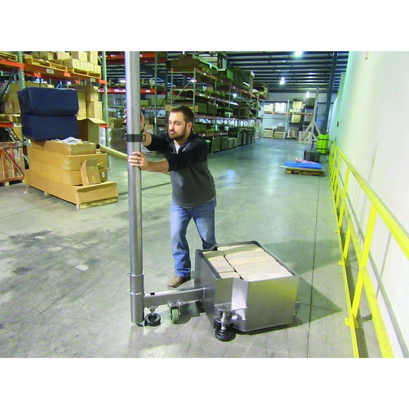 First Team PortaCourt Stellar Portable Recreational Volleyball System - person in warehouse