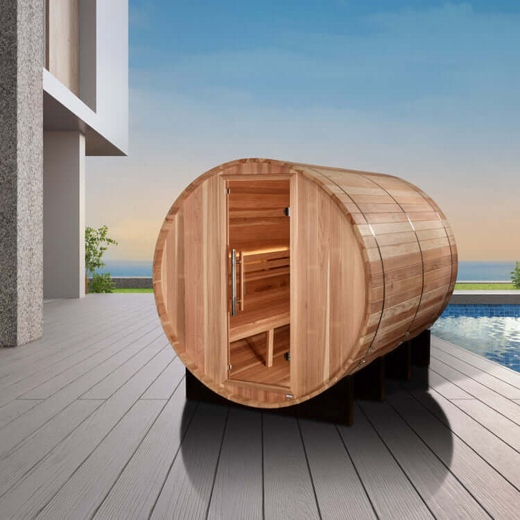 Golden Designs "Klosters" 6 Person Barrel Traditional Steam Sauna - Pacific Cedar - A wooden barrel on a wooden deck with a pool in the background