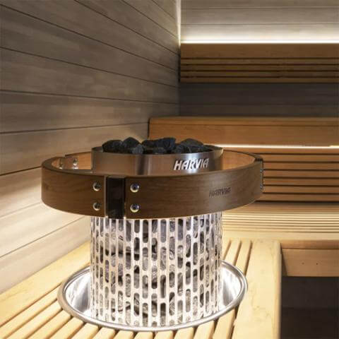 Harvia Cilindro Half Series Stainless Steel Sauna Heater - built inside a sauna room with wooden bench and wooden walls