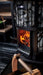 Harvia Legend GreenFlame Series 240 Wood Stove Sauna Heater - with burning firewoods inside the stove