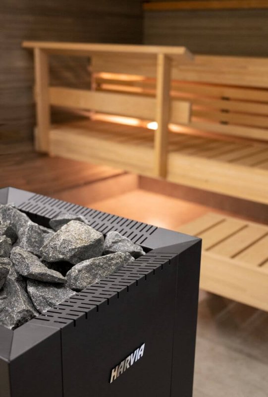 Harvia Linear 22 GreenFlame Series Wood Stove Sauna Heater - different rock sizes inside a metal box