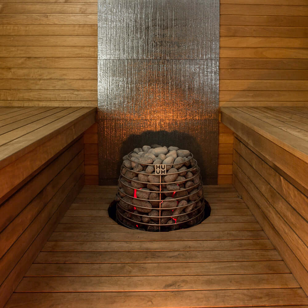 HUUM HIVE Series 15.0kW Sauna Heater Package - inside a wooden enclosed sauna room