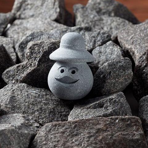 Hukka Lyyli Sauna Elf with Bucket Hat - On top of sauna stones