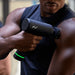 Hyperice Hypervolt 3 Pro - close up image of a man using Hypervolt on his left arm