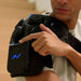 Hyperice X 2 Shoulder - close up image of X 2 being used by a man