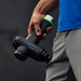 Hypervolt 2 Pro Massage Gun - Close up photo of a hand holding massage gun