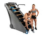 Jacobs Ladder X - JLX Machine - A man sitting on the ladder with a woman standing beside