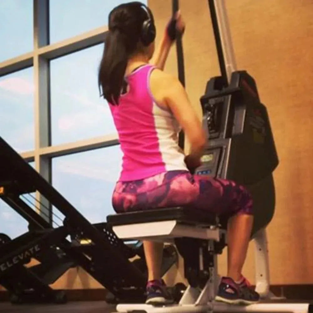 Marpo VLT Rope Trainer - a woman in pink top using rope trainer