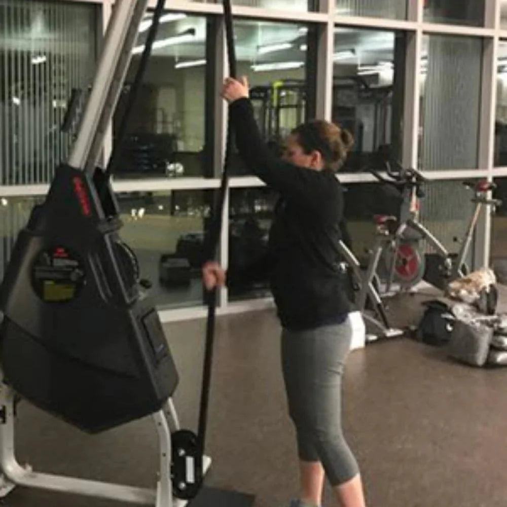 Marpo VMX Rope Trainer Multi-Mode - Side view of a woman in a gym using rope trainer