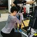 Marpo VMX Rope Trainer Multi-Mode - a woman with short hair pulling rope in a gym