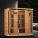 Maxxus 4-Person Near Zero EMF FAR Infrared Sauna - indoors next to a couch