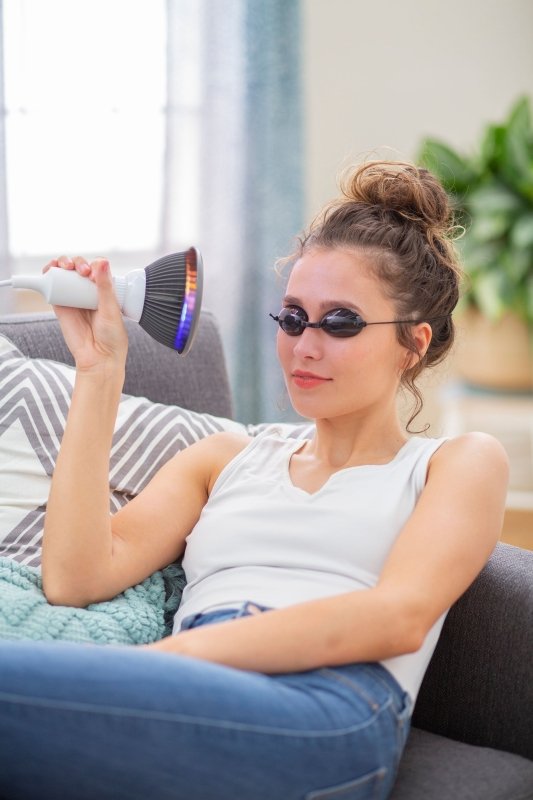 Orange LED Light Therapy - woman wearing goggles