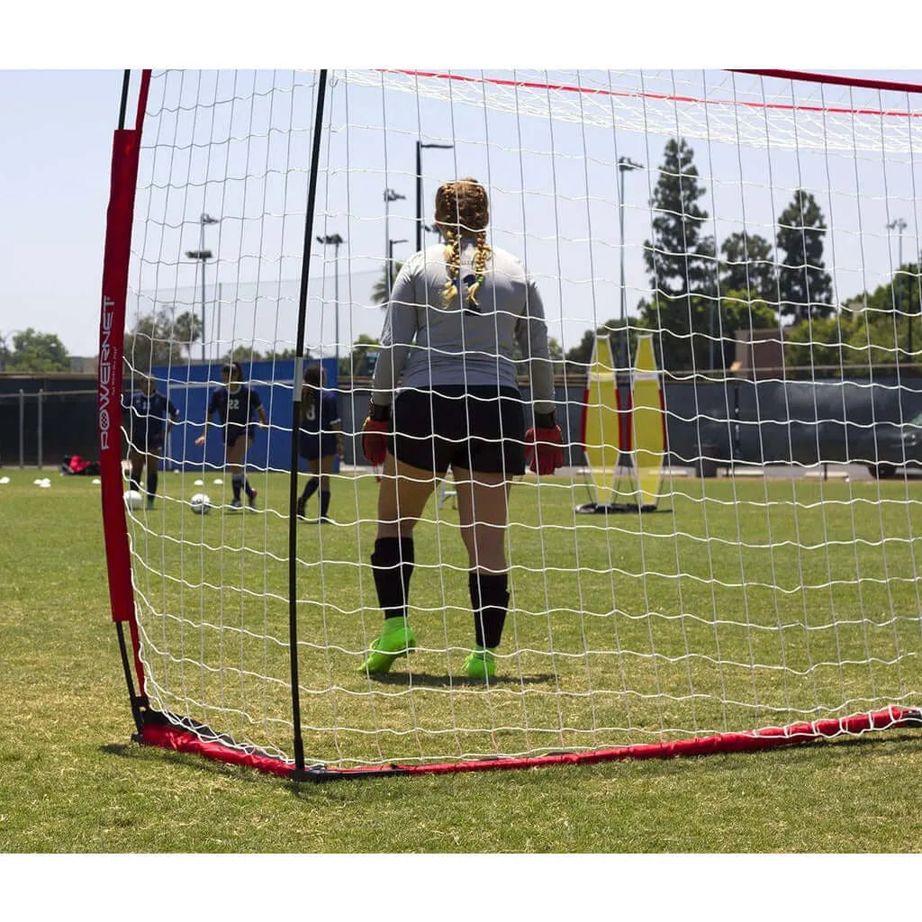 Powernet 14x7 Portable Framed Soccer Goal S005 - women standing next to the net 