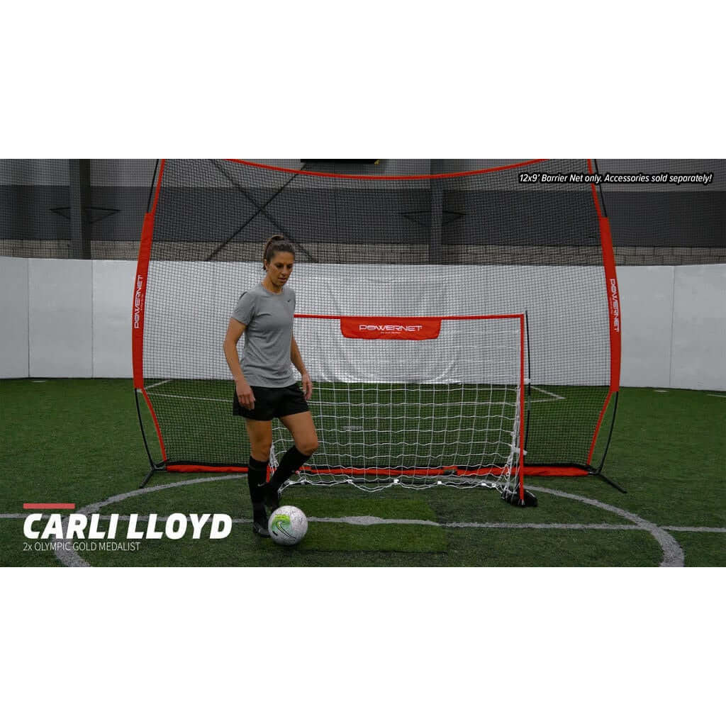Powernet 12x9 Sports Barrier Net 1021 - Carli Lloyd in front of the net