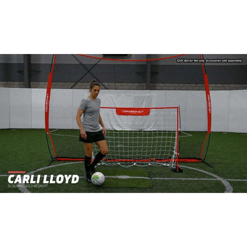 Powernet 12x9 Sports Barrier Net 1021 - Carli Lloyd in front of the net