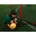 A girl holding a soccer ball beside Powernet 16x10 Ft Soccer Goal Combo Barrier 1214