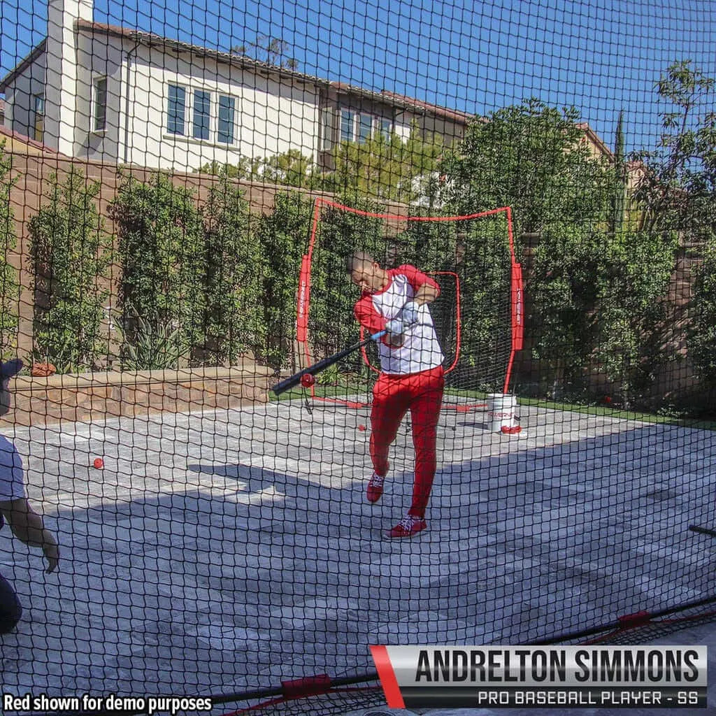 Powernet 16x10 FT Sports Barrier Net 1153 - A person in red athletic wear practices baseball batting in a backyard