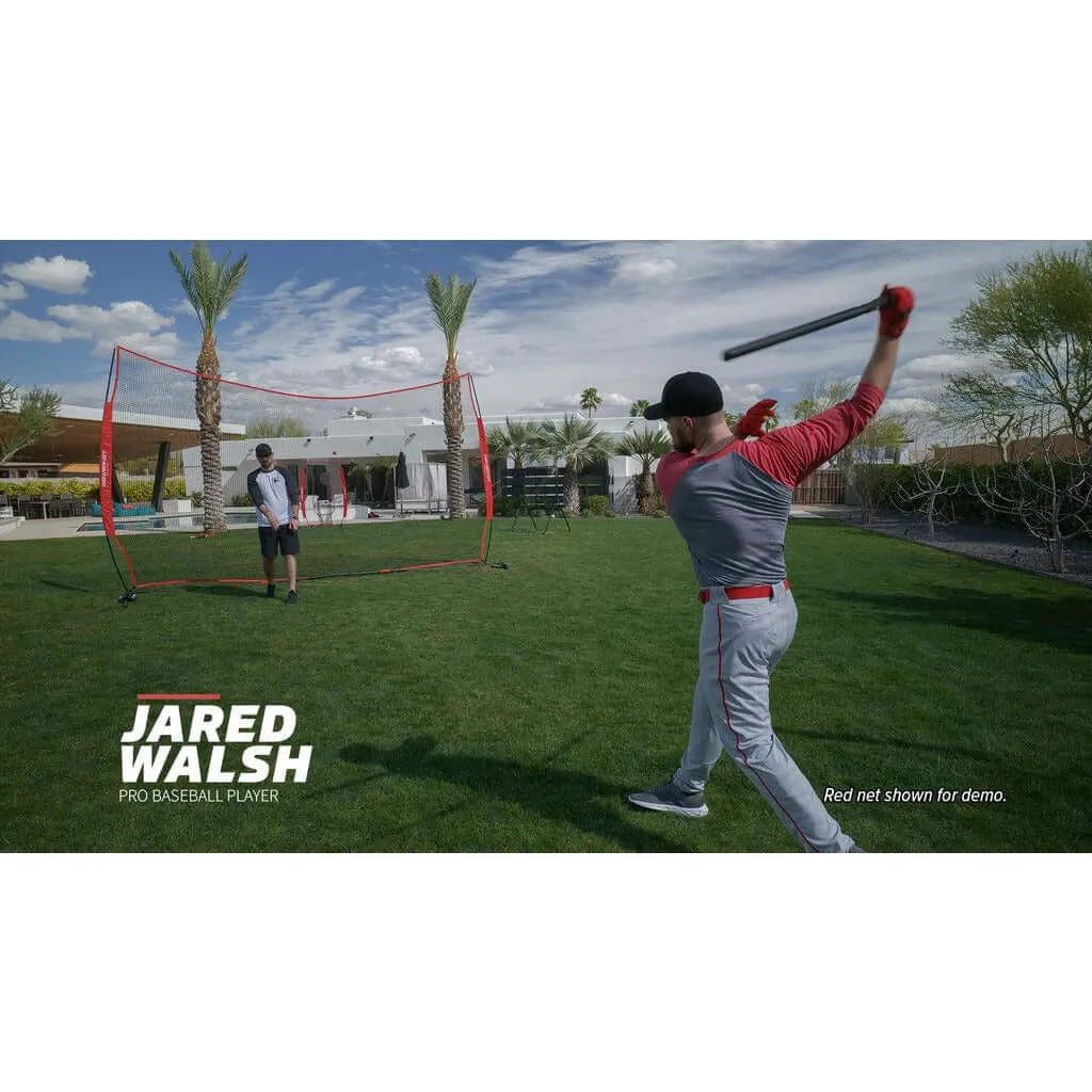 Powernet 16x10 FT Sports Barrier Net 1153 -  A baseball player swings a bat energetically in a sunny backyard, ready to hit a pitch.