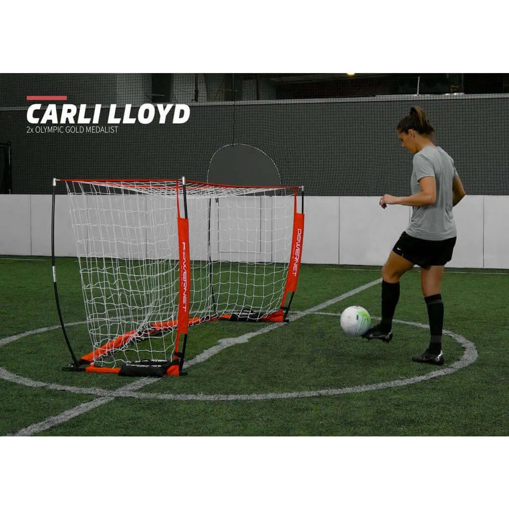 Olympic gold medalist Carli Lloyd playing soccer using Powernet Soccer Goal 8x4 Portable Bow Style Net S002