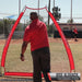 Pro Baseball Coach Jose Alguacil using a Powernet A-Frame Baseball Pitching Screen Net 1002