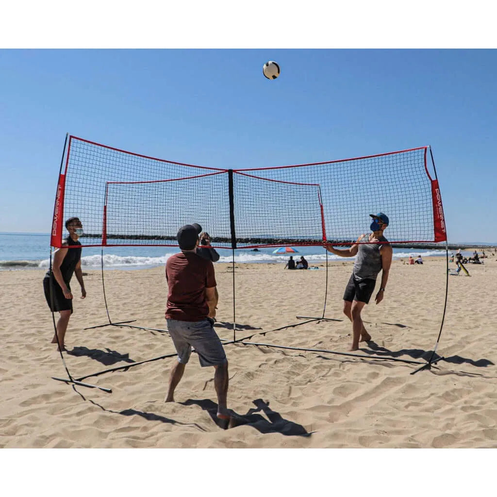 Powernet Volleyball Four Square Net in a beach being used by people playing volleyball