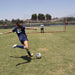 Two girls playing outdoor soccer using Powernet Soccer Goal Regulation Size 24x8 Net S007