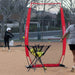 Powernet I-Screen Net for Batting Practice -  A woman throws a softball to a girl, both focused and ready for the catch in a sunny outdoor setting.