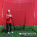 Powernet 8x8 XLP PRO Net 1026 - Kelly Kretschman holding a softball bat beside the net