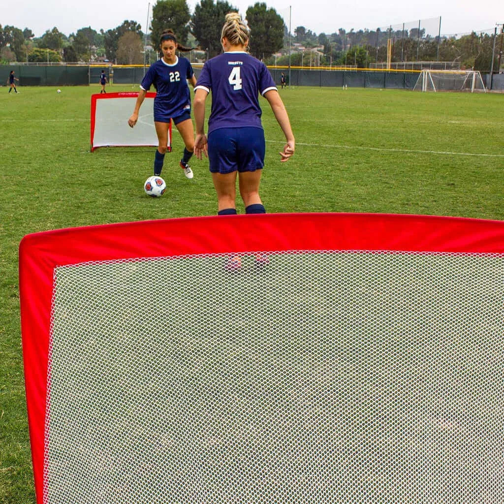 Powernet Soccer Popup Net Portable Goal 4'x3' (PAIR) S004 - Two young female soccer players practice 