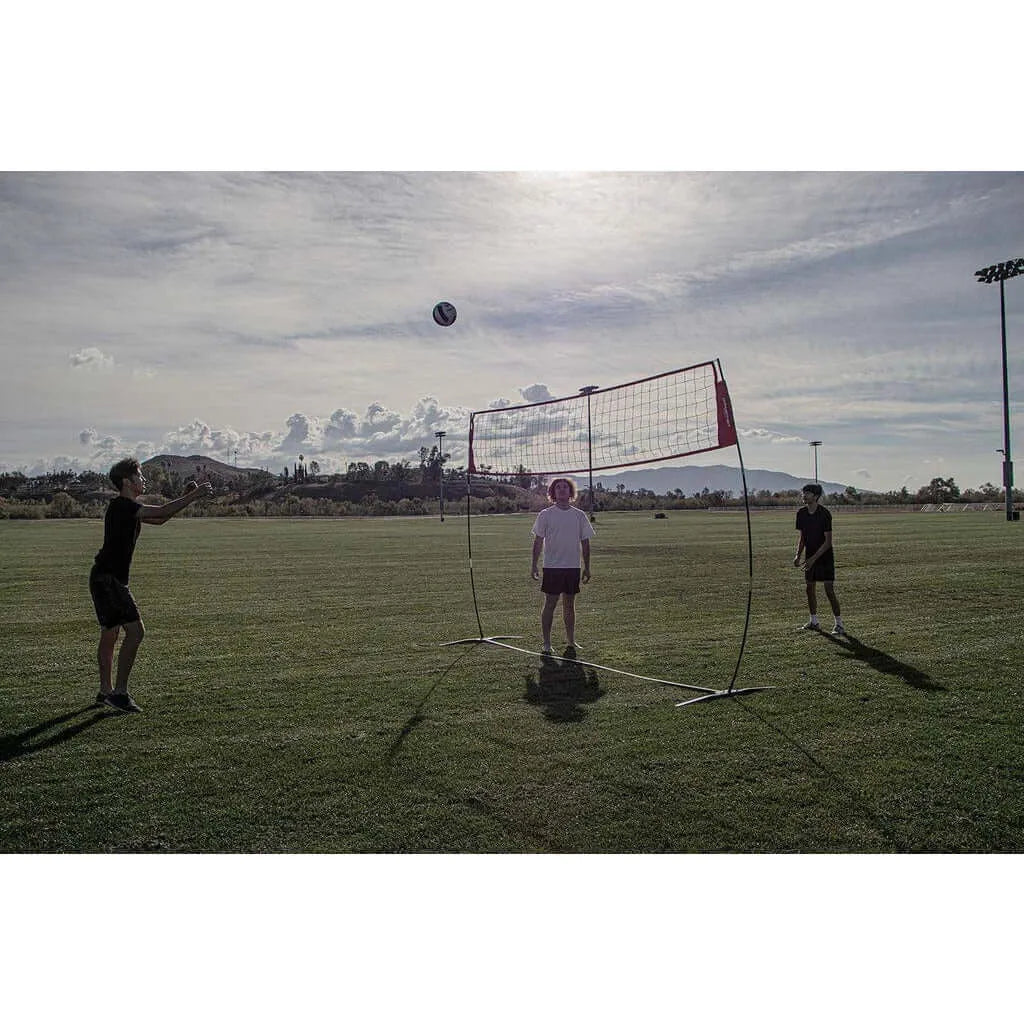 Powernet Freestanding Volleyball Warm Up Net 1178 - with volleyball players outdoors