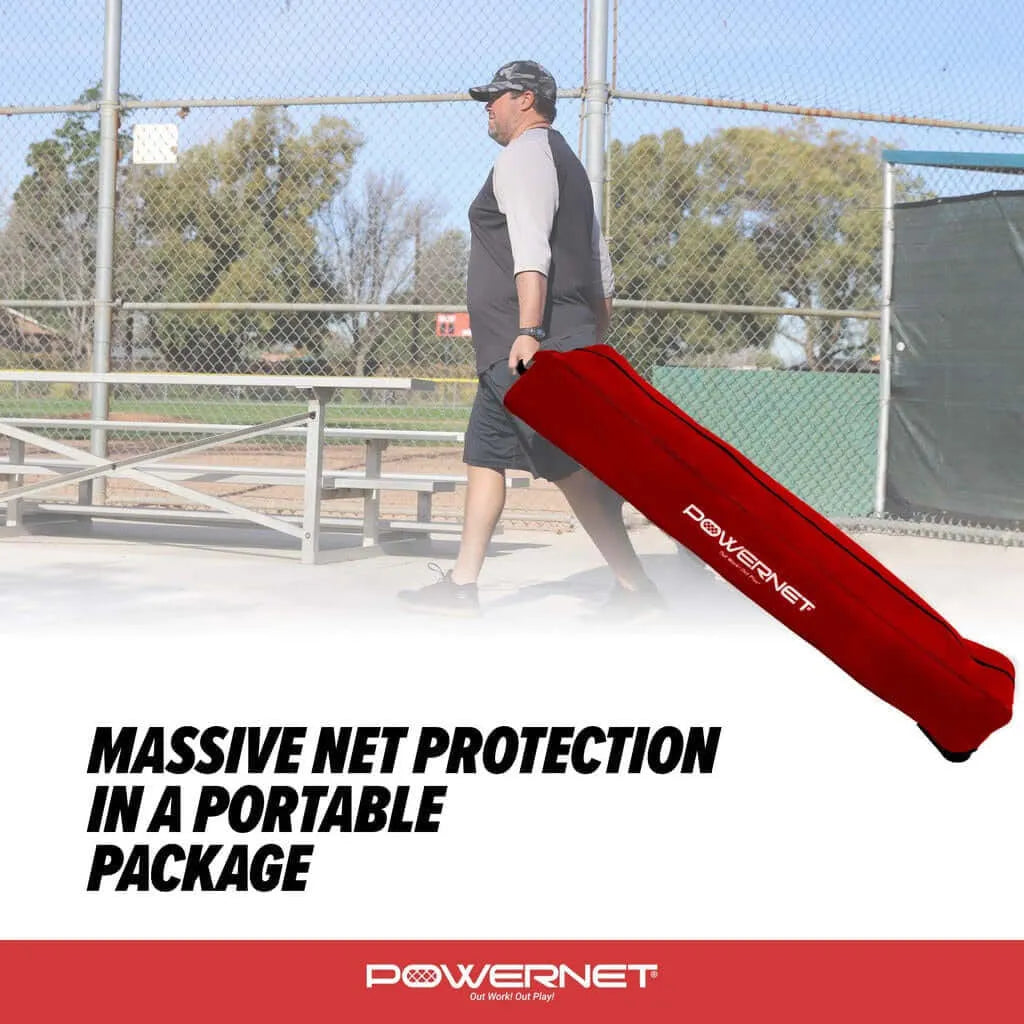 Powernet XL Sports Barrier Net 21.5 x 11.5 FT 1025 - man carrying the net bag
