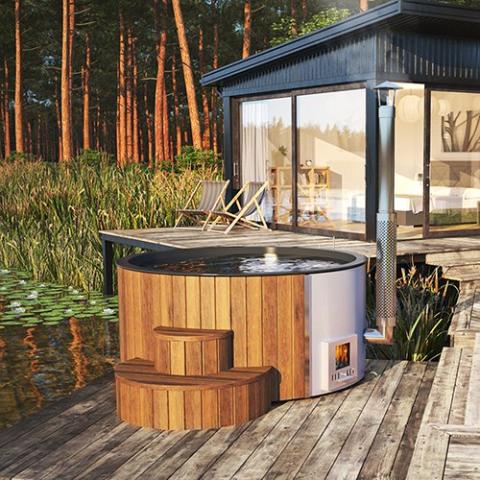 SaunaLife Model S4N Wood-Fired Hot Tub - a hot tub on a dock assembled outdoor