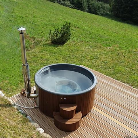 SaunaLife Model S4N Wood-Fired Hot Tub - Tub assembled outdoor in the grass