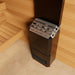 Saunum AIR 7 WiFi Sauna Heater Package - next to a wooden bench